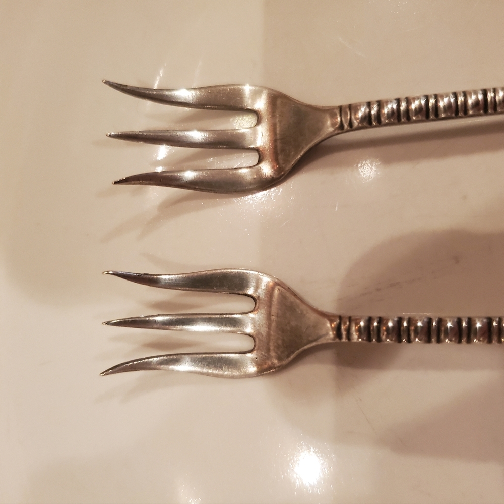 Silver plated cocktail forks. Roger & Bros.